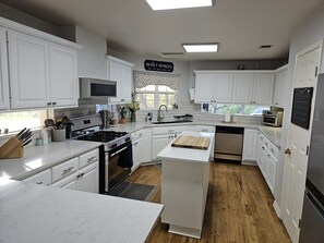 Full kitchen - great view of the side and front of the home from the kitchen. 