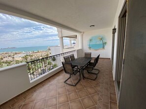 Breezy Private Balcony with Outdoor Dining