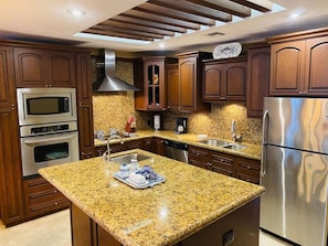 Custom Kitchen with Granit Counters and Stainless Appliances