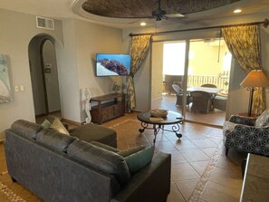 Spacious Living Area with Coved Ceiling & SmartTV