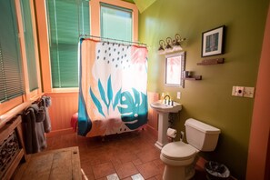 Full bathroom with clawfoot tub/shower combination