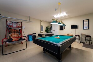Game Room showing pool table air hockey and basketball hoop