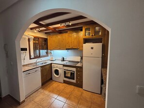 Large, bright and spacious kitchen, which is fully equipped with all necessary cutlery, crockery, glasses and cooking utensils