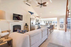 Relaxing living room area with TV