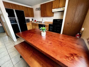 Unit 1 Kitchen and dining room.  Dining table seats 6.