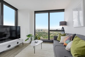 Floor-to-ceiling windows in the living area offer abundant light and sweeping views of Melbourne, while split system heating and air-conditioning ensure year-round comfort. 
