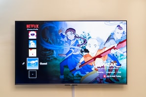 65 inch Smart TV with Netflix and Amazon Prime.