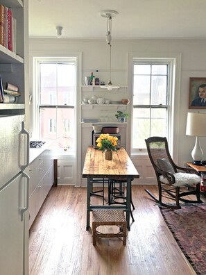 Kitchen island adds extra work space and seats 4.