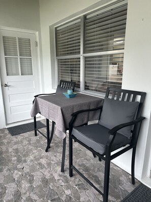Back screened in patio.