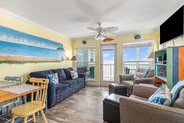 Living area with open view of the ocean from the sofa