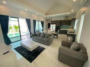 Living area with pool view
-Kitchen
-Dining table