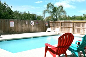 Full size pool with lounge furiture