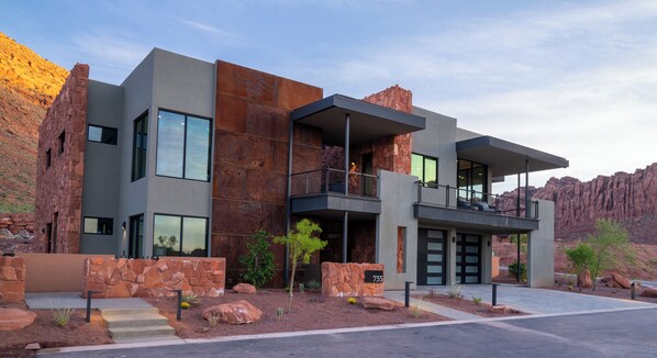 Take the steps to the left of this photo to enter into your lockoff retreat in this luxury Villa