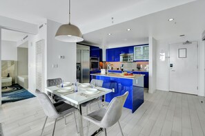 Dining Area | Lends a warm welcome + offers an open concept layout into living and kitchen areas.