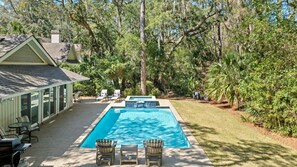 Backyard with private pool, spa, grill and seating area