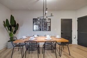 Unit 4: Dining space for 6 with designer furnishings.