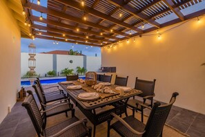 Immerse yourself in outdoor dining amidst the vibrant Caribbean atmosphere through day and night.