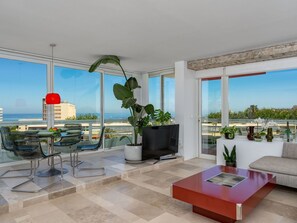 Plant, Furniture, Property, Sky, Flowerpot, Table, Couch, Houseplant, Building, Shade