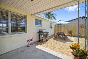 Propane Grill and covered picnic area to eat and enjoy Florida's weather