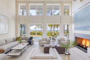 Floor-to-ceiling windows bring the ocean views inside.