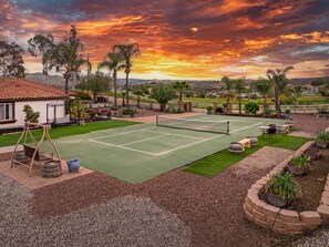 Immaculate grounds with a pickleball court.
