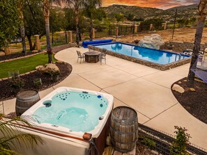 Private pool and hot tub for ultimate relaxation.