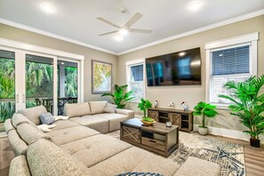 Spacious Living Area with Large Smart TV