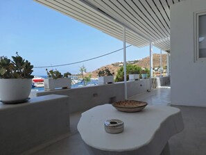 Sea-view dining setup on the exterior patio

