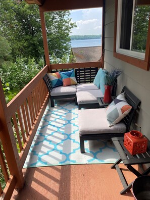 Top story balcony leading to the entrance to the 4 bedroom unit