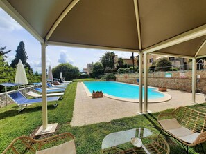 Water, Property, Plant, Sky, Swimming Pool, Shade, Building, Outdoor Furniture, Architecture, Tree