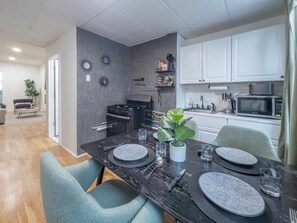 Step into cozy and stylish dining space designed for comfort and connection.