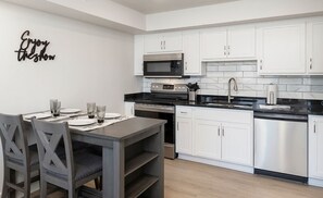 Full kitchen and nice dining area