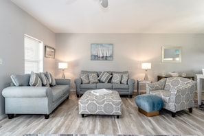 The living room seats 7, and there's a cushion with your name on it!