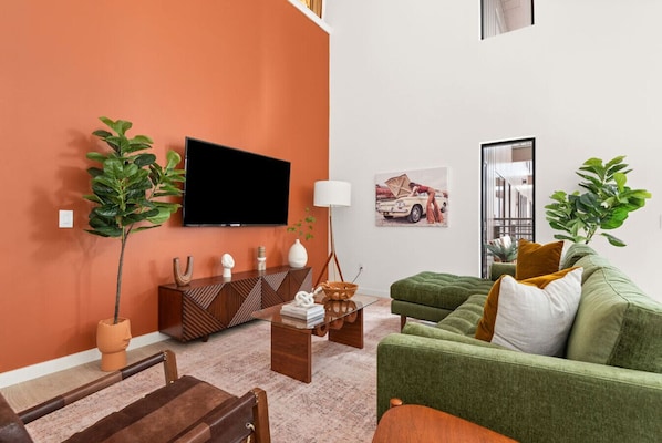 Living Space features a comfy sofa, a flat screen with HuluLive