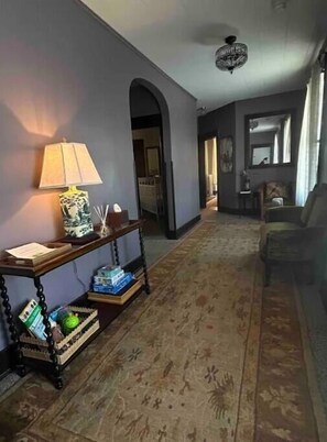 Large Foyer with warm furnishings greets you upon arrival.