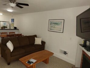 Living room area w/ queen sleeper sofa