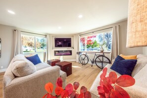 Relax in a welcoming space featuring a plush couch and loveseat.