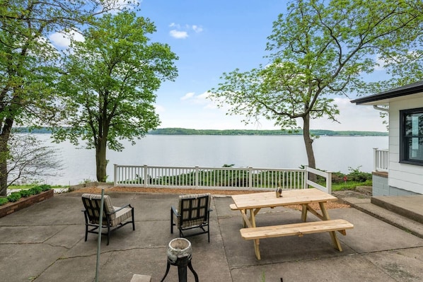 The patio beckons relaxation and admiration of the surrounding nature.