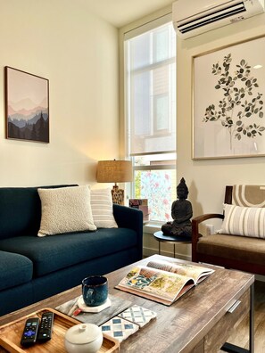 Sofa (not a pull-out) and additional seatings can host 6 guests comfortably.