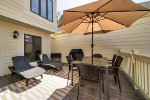 Large front deck for dining al fresco or hanging out on the chaises while you BBQ