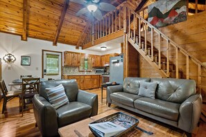 The living room is a comfortable place to gather with friends and family. 