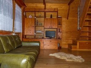 Wood, Window, Building, Flooring, Interior Design, Floor, Couch, Wood Stain, Hardwood, Tree