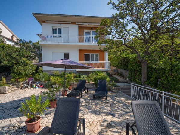 Plant, Building, Sky, Property, Furniture, Window, Flowerpot, Tree, Chair, House