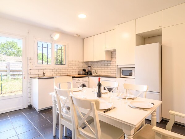 Table, Cabinetry, Furniture, Property, Window, Countertop, Wood, Chair, Lighting