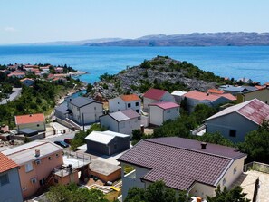 Water, Sky, Building, Property, Nature, Azure, Architecture, Urban Design, Coastal And Oceanic Landforms, House