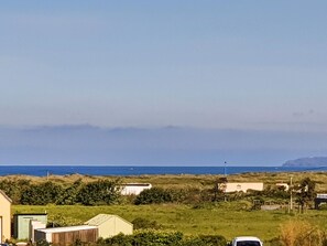 Himmel, Pflanze, Eigentum, Wolke, Ökoregion, Grundstueck, Gras, Haus, Natürliche Landschaft, Küsten Und Ozeanische Forms