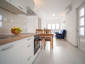Cabinetry, Countertop, Property, Furniture, Window, Wood, Drawer, Building, Kitchen, Interior Design