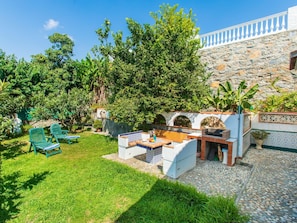 Plant, Sky, Azure, Outdoor Furniture, Shade, Natural Landscape, Vegetation, Leisure, Urban Design, Tree