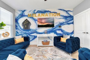 MelaNation Living Room With Cozy Couch