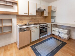 Countertop, Cabinetry, Furniture, Sink, Kitchen Sink, Kitchen, Kitchen Stove, Building, Kitchen Appliance, Wood